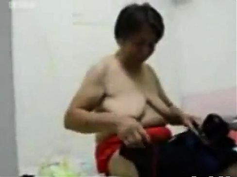 Asian Grandma get dressed after sex